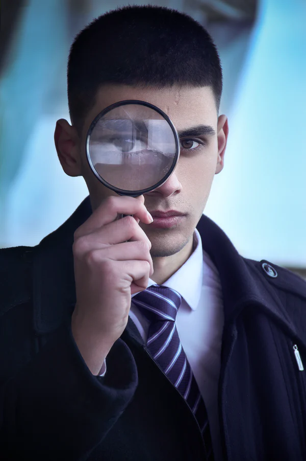 Man with magnifying glass